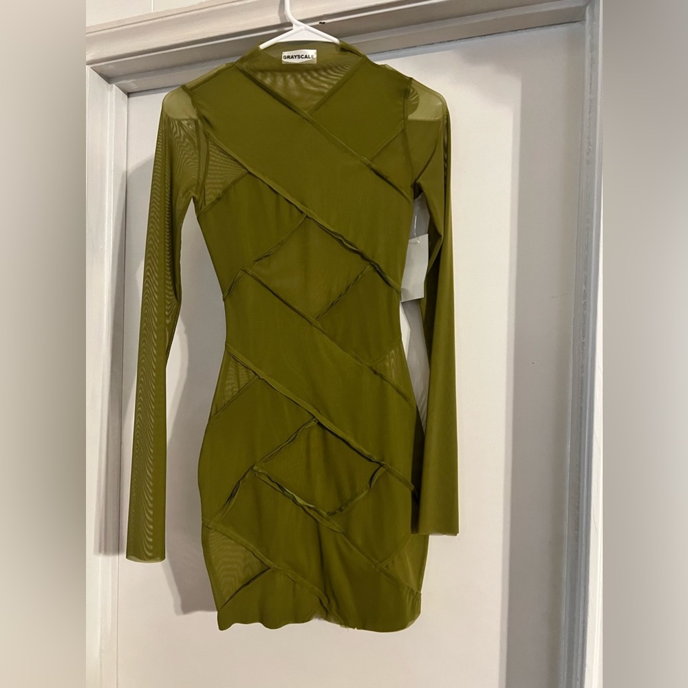 Super sexy dress. Never worn. Tags still on. Smoke free home.